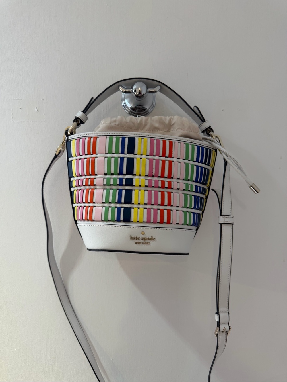 kate spade White Multi-Stripe Woven Bucket Crossbody